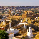 View of Guadix town, the cave houses and Cathedral in the background